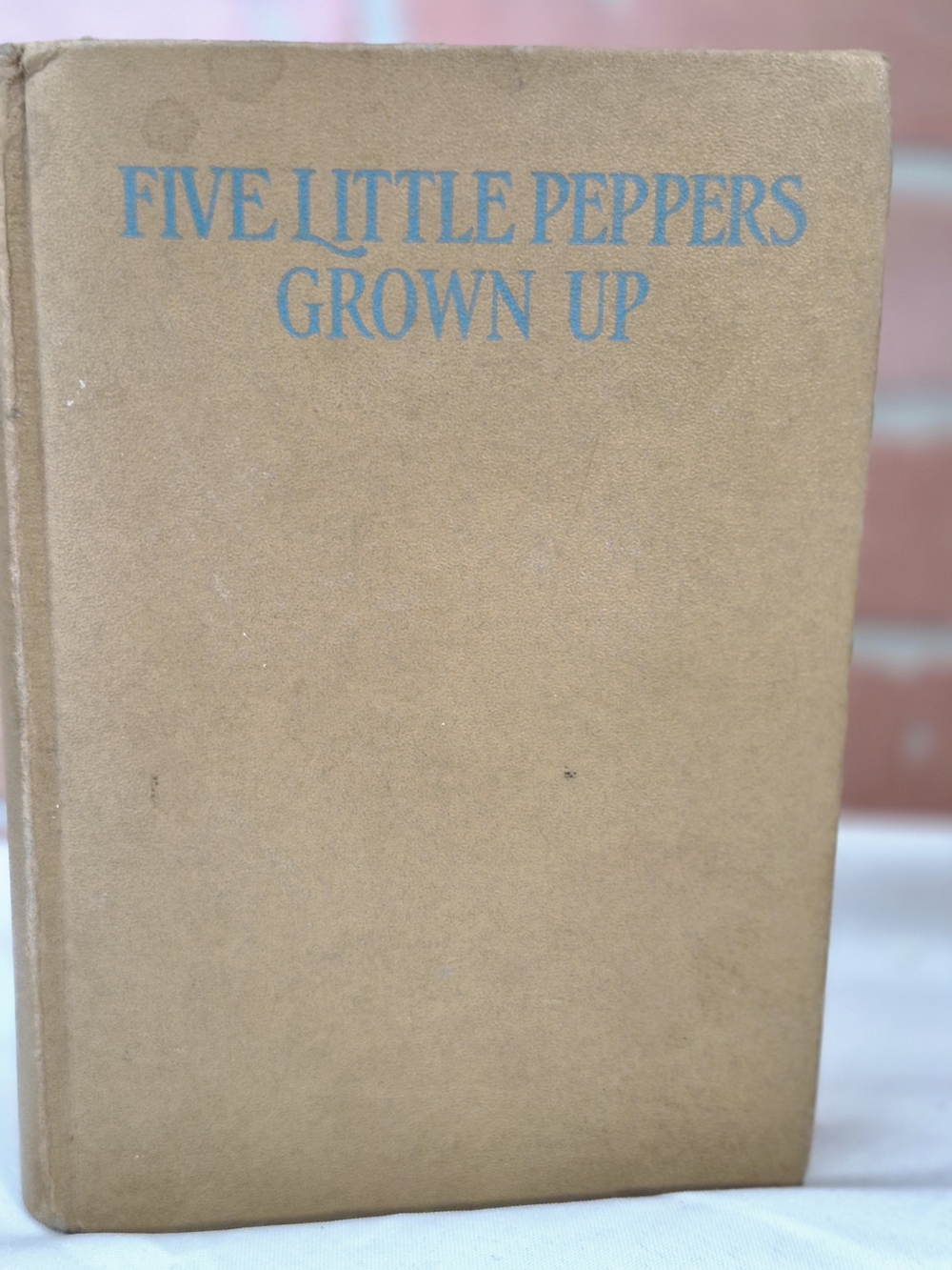 Antique Bookhardcover edition of Five Little Peppers Grown Up by Margaret Sidney
